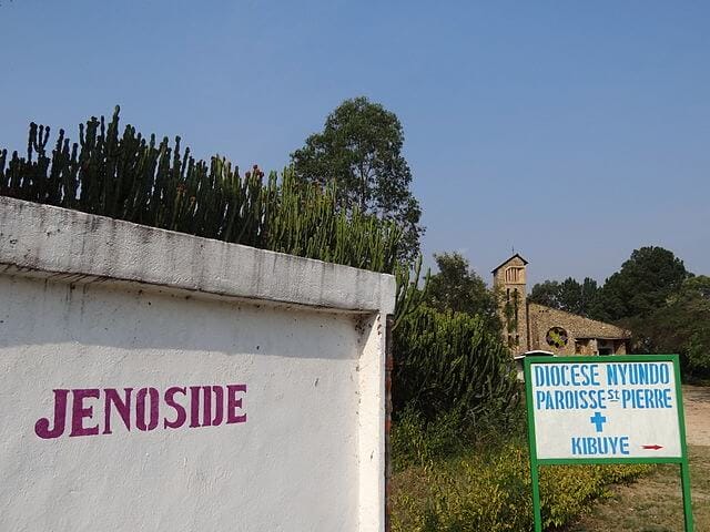 Kibuye Jenoside : Genocide Sign with Facade of Genocide Memorial Church, Karongi ,Western Rwanda